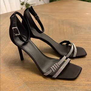 Chic Black Sandals with Silver Embellishments